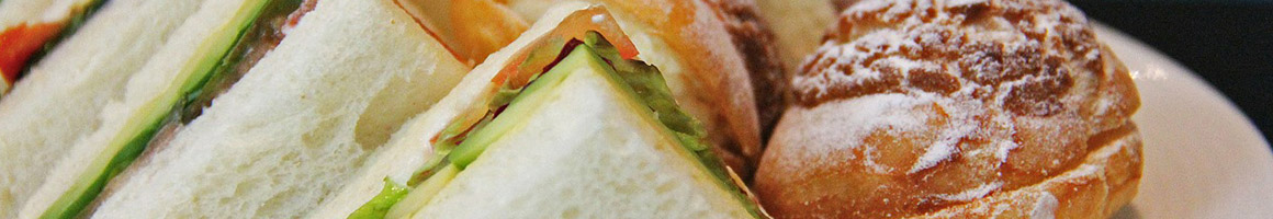 Eating Sandwich Cheesesteak at Phillycious restaurant in Spokane, WA.